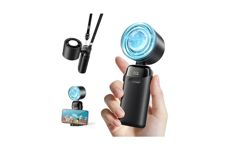 0_ 62316 - crasi Handheld compact pocket projector attached to a phone, projecting a blue light onto a surface