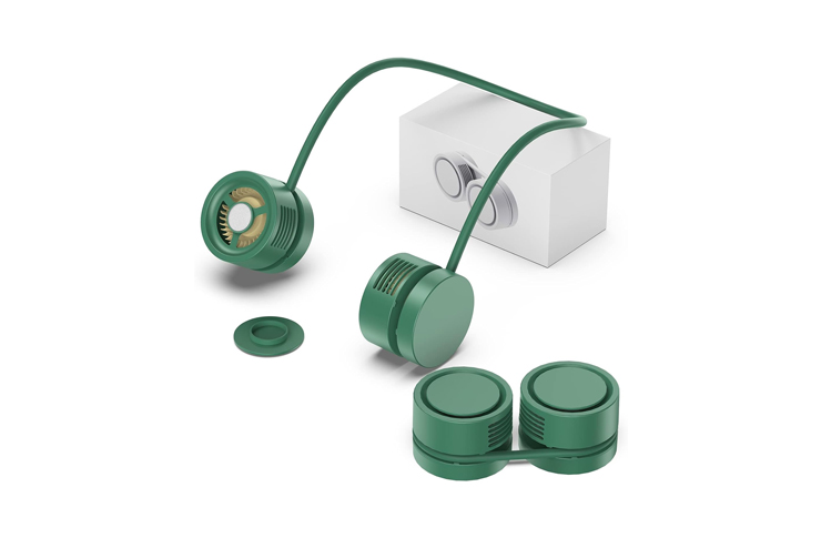 Green modular camera lens kit with two circular lenses connected by a flexible band, displayed with packaging in the background.