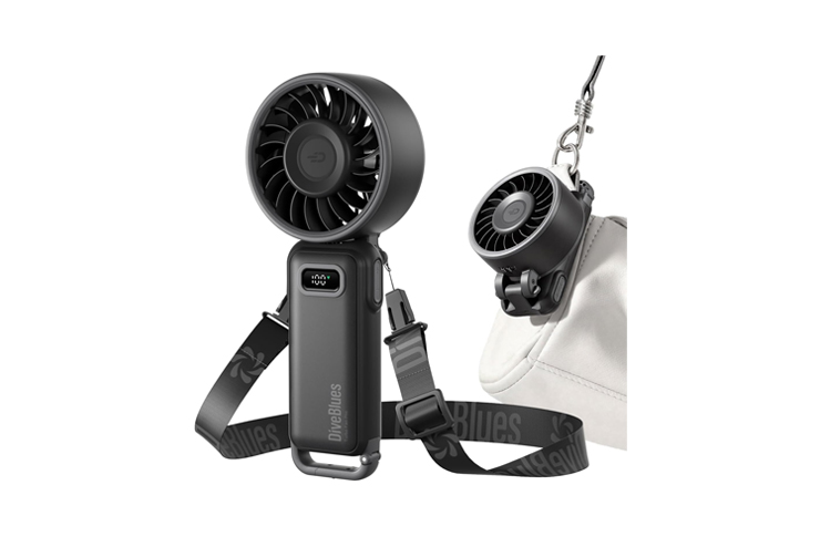 Portable handheld USB fan with a large round turbine, gray body, and detachable strap clipped to a bag.