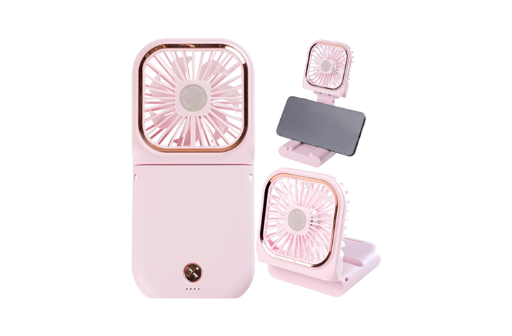Compact pink portable handheld fan with a fold-out phone holder and stand, shown from multiple angles for a personal cooling setup.