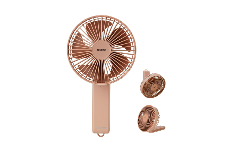 Rose-gold portable fan with detachable components shown in desk and handheld configurations (full-size, compact, and folded stand).