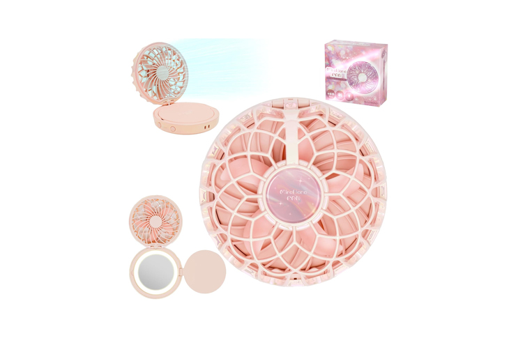 Pink portable mini fan set: a large circular fan with a lattice grille, plus a smaller round fan, a makeup compact/mirror, and a pink product box in the background.