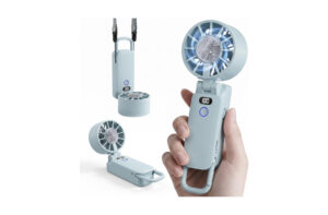 Compact USB-rechargeable handheld fan with circular head and digital display, shown in hand and with foldable handle.