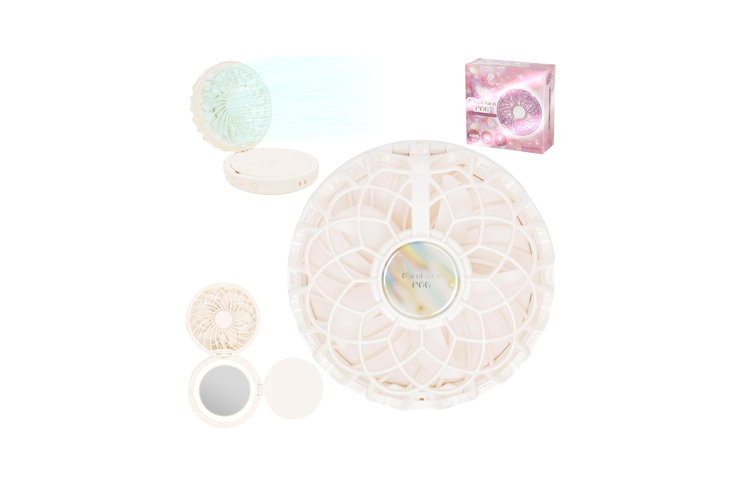 0_62679 - crasi A circular handheld fan surrounded by small beauty accessories and a pink box, set against a white background.
