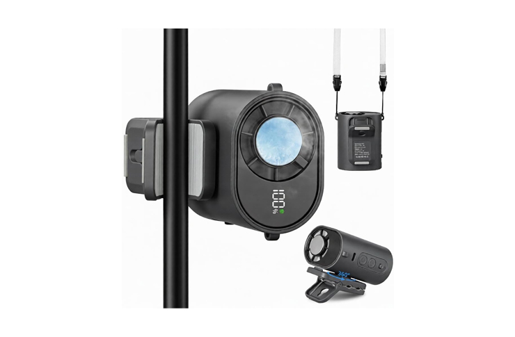 Camera mounting kit with a circular main unit attached to a vertical pole, plus a small action camera and a hanging battery pack.